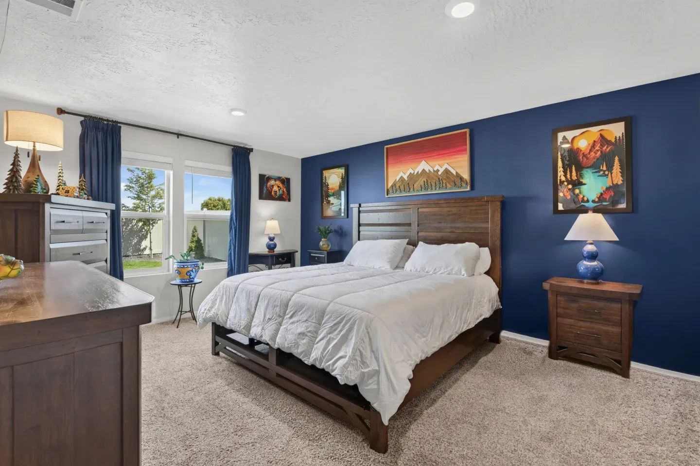 Bedroom with navy accent wall